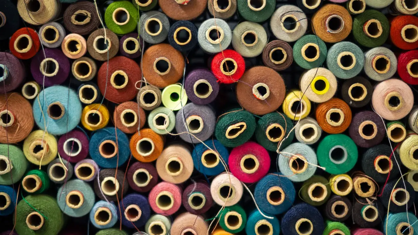 Cotton vs. Polyester vs. Heavyweight Blends: Selecting Garment Fabric & GSM Weight